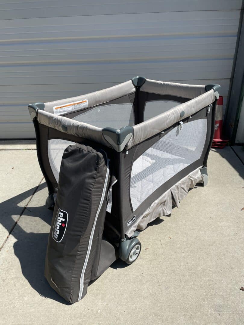 Lullaby® Portable Playard w/ Infant Attachements & Rolling Carry Bag, Overall Great Condition, but pad cover needs cleaning!