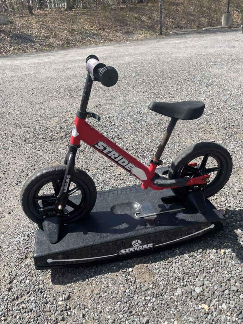 Strider 12” Sport Bike + Rocking Base - Helps Teach Baby How to Ride a Balance Bicycle - Outdoor Rusting Present